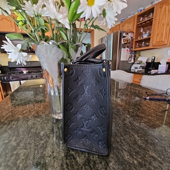 SOLD. Louis Vuitton On The Go PM - Picture 6 of 13